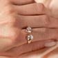 Ring with a round crystal