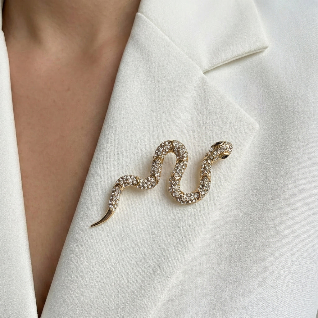 Broša ar zelta kristāliem čūskas formā